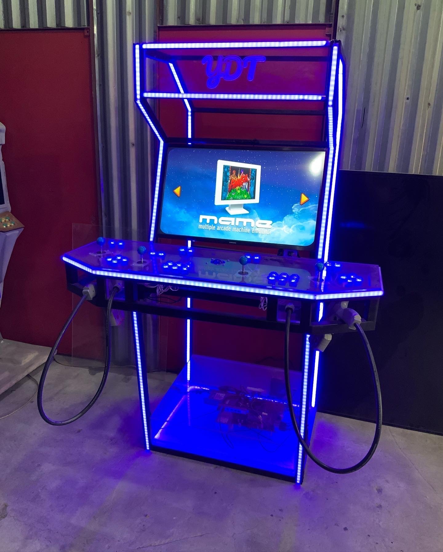 Compact bartop arcade machine sitting on a wooden bar